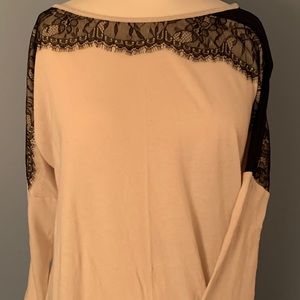 Chico’s size 2 cream top with black lace. NWOT